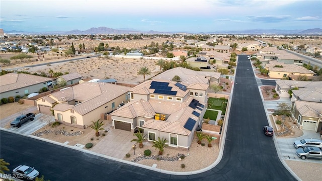 birds eye view of property featuring a residential view and a mountain view