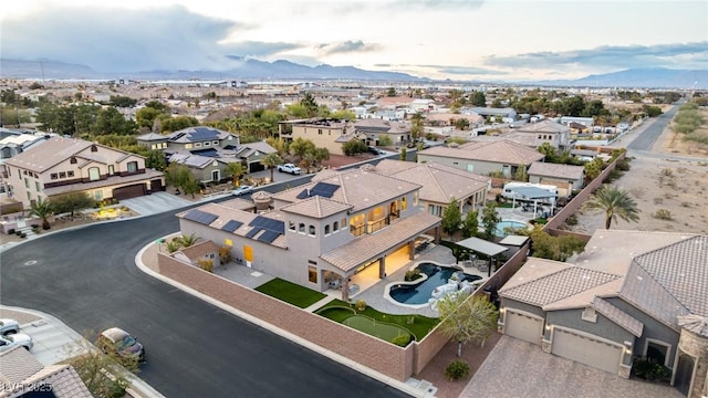 bird's eye view featuring a residential view and a mountain view