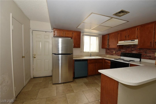 kitchen featuring under cabinet range hood, a sink, electric stove, freestanding refrigerator, and dishwasher