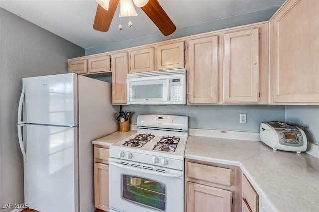 kitchen featuring light countertops, white appliances, light brown cabinets, and ceiling fan