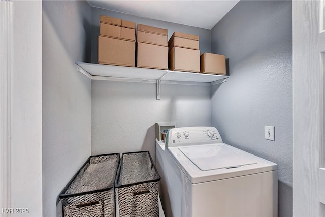 laundry area with washer / dryer and laundry area