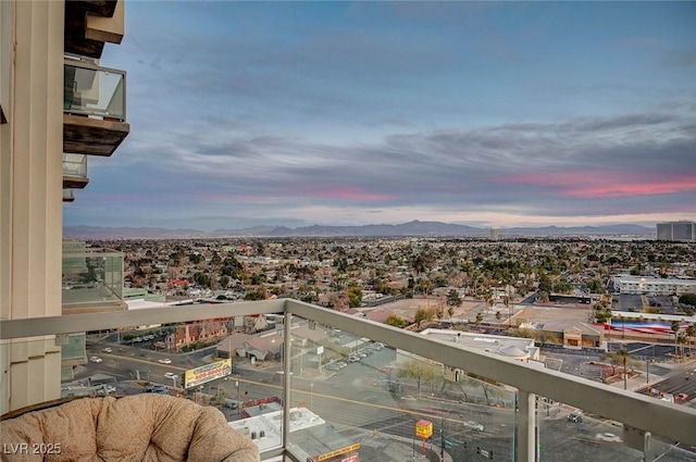 balcony at dusk with a mountain view