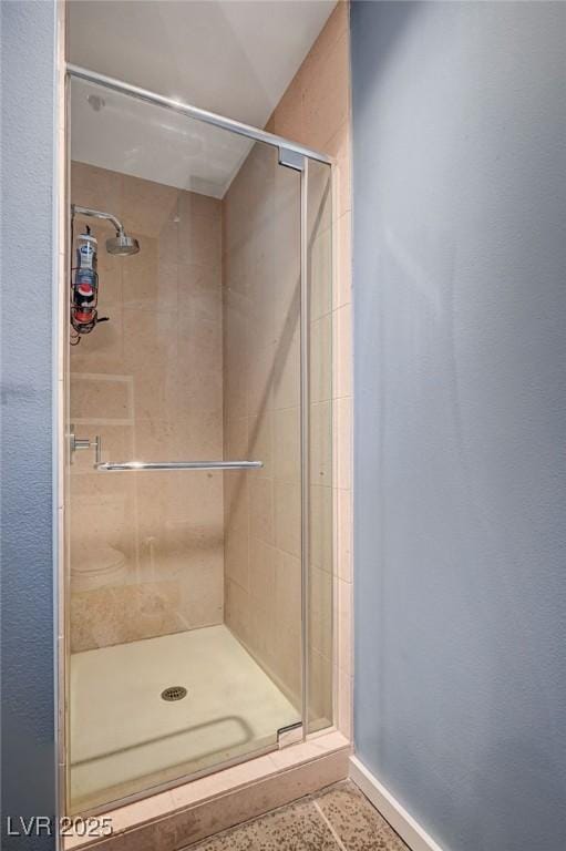 bathroom featuring a stall shower