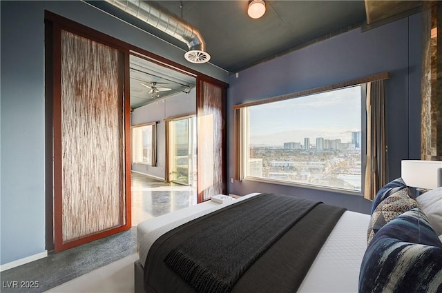 bedroom with a city view