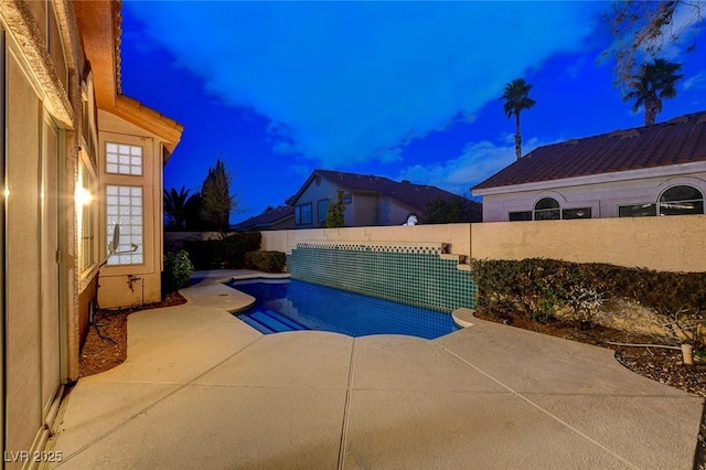 view of pool with a patio area and a fenced backyard