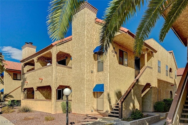 view of building exterior with stairway