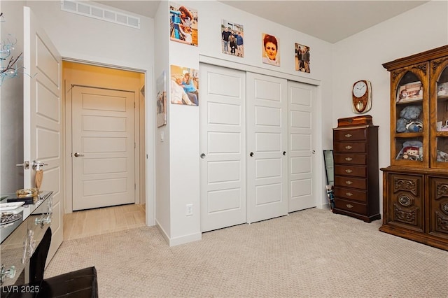 4560 E Cactus Canyon Dr, Pahrump, NV 89061 - carpeted bedroom featuring baseboards, visible vents, and a closet