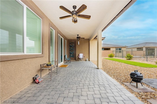 4560 E Cactus Canyon Dr, Pahrump, NV 89061 - view of patio / terrace featuring a ceiling fan, fence, and grilling area