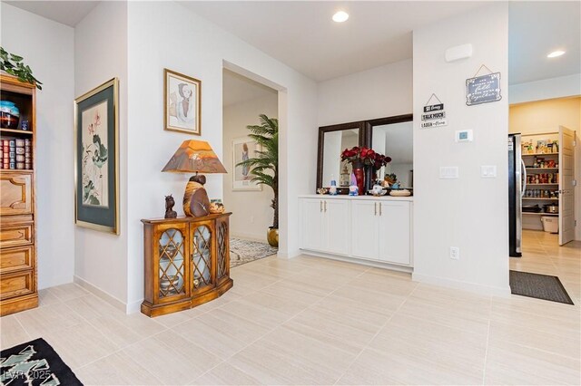 4560 E Cactus Canyon Dr, Pahrump, NV 89061 - hallway featuring baseboards, light tile patterned flooring, and recessed lighting