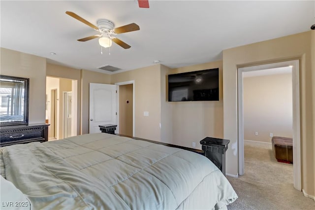 bedroom featuring baseboards, visible vents, a ceiling fan, and light colored carpet