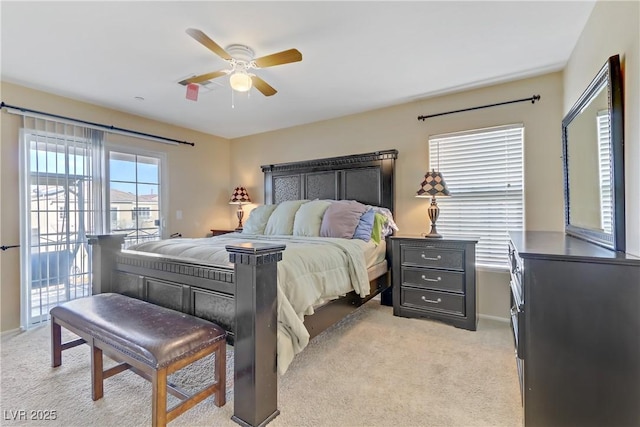 bedroom featuring light carpet, access to outside, baseboards, and a ceiling fan