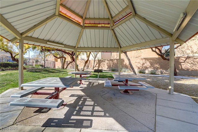 view of patio featuring a gazebo and fence