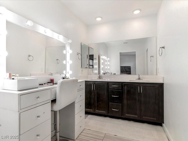 bathroom with double vanity and a sink