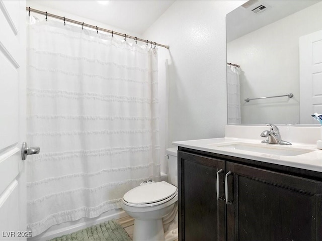 full bath with curtained shower, visible vents, vanity, and toilet