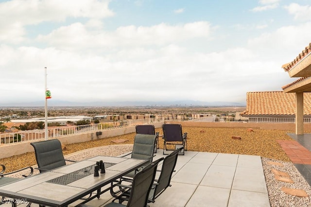 view of patio / terrace featuring outdoor dining space and fence