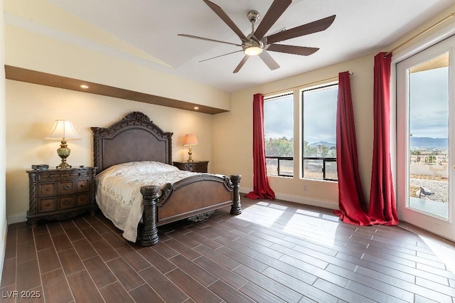 bedroom with dark wood finished floors, baseboards, and ceiling fan