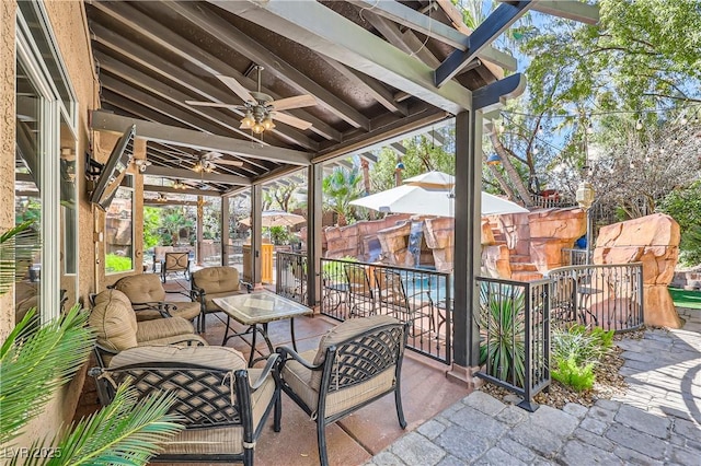 view of patio with ceiling fan