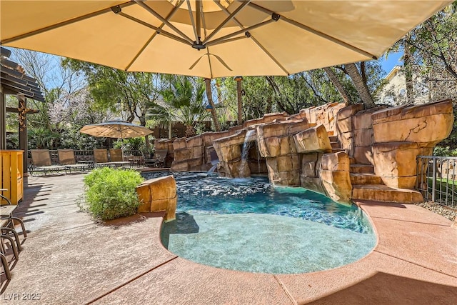 view of pool featuring a patio area