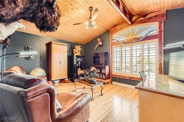 living room featuring vaulted ceiling with beams, hardwood / wood-style floors, ceiling fan, wooden ceiling, and baseboards