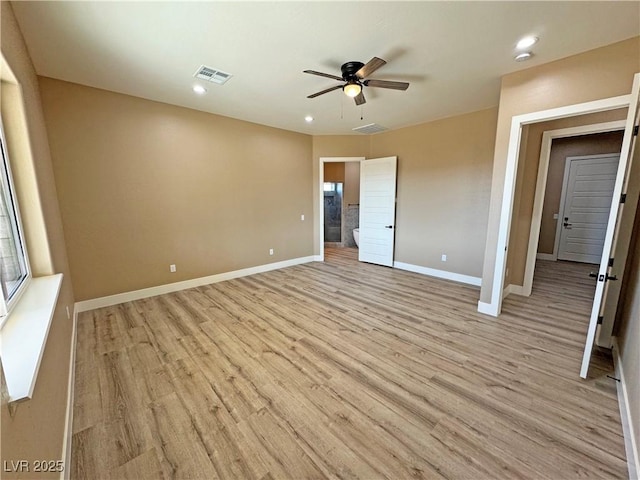 3080 S Prairie Ave, Pahrump, NV 89048 - unfurnished bedroom featuring baseboards, recessed lighting, light wood-style flooring, and visible vents