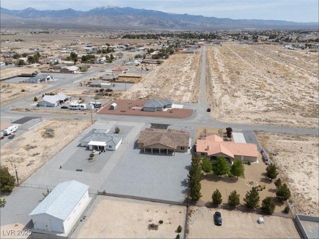 3080 S Prairie Ave, Pahrump, NV 89048 - drone / aerial view with a mountain view, a rural view, and view of desert