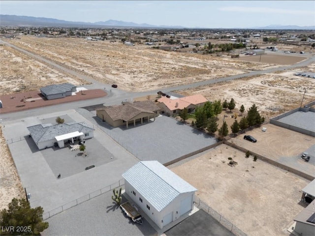 3080 S Prairie Ave, Pahrump, NV 89048 - drone / aerial view featuring a mountain view and view of desert