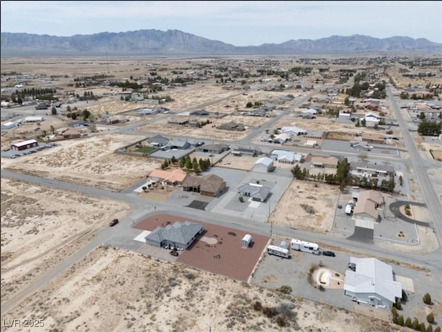 3080 S Prairie Ave, Pahrump, NV 89048 - birds eye view of property with a desert view and a mountain view