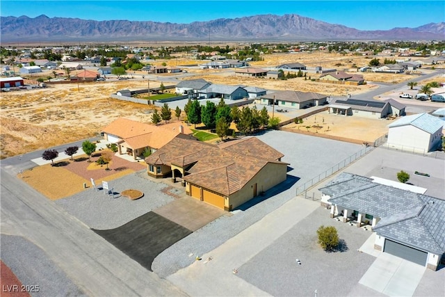 3080 S Prairie Ave, Pahrump, NV 89048 - aerial view of residential area featuring a mountain backdrop