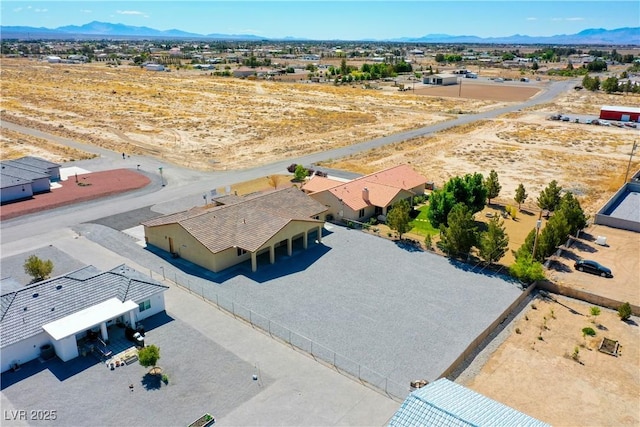 3080 S Prairie Ave, Pahrump, NV 89048 - aerial view of residential area featuring mountains and a desert landscape