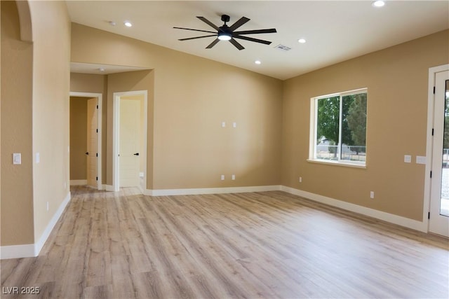 3080 S Prairie Ave, Pahrump, NV 89048 - unfurnished room featuring vaulted ceiling, light wood-style flooring, ceiling fan, recessed lighting, and baseboards