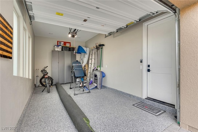 exercise room featuring a garage