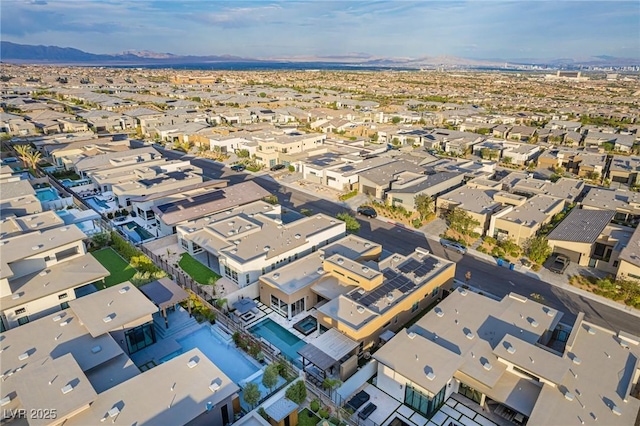 birds eye view of property with a residential view