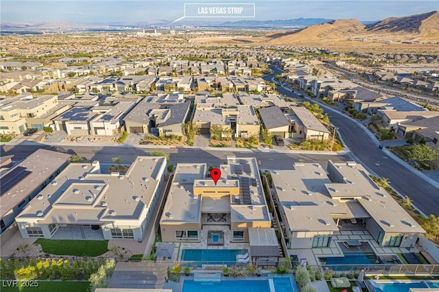 birds eye view of property featuring a residential view and a mountain view