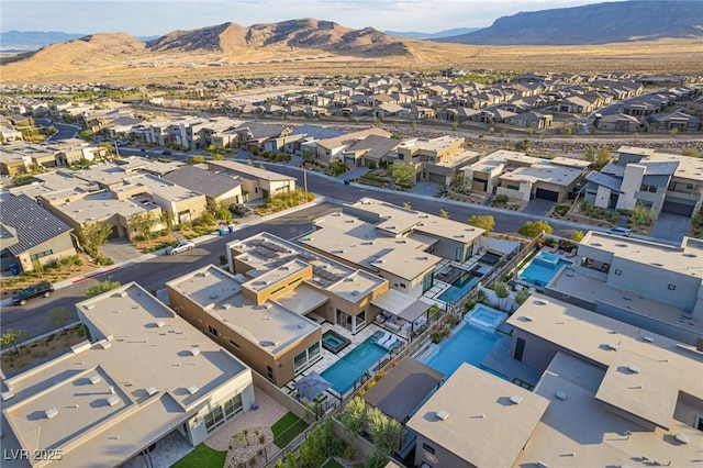 aerial view featuring a mountain view and a residential view