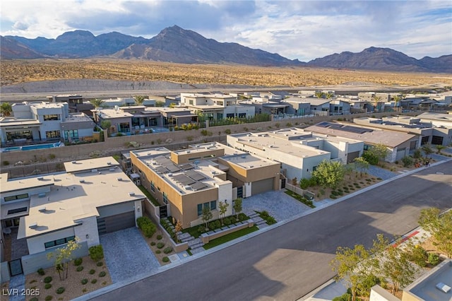 bird's eye view with a residential view and a mountain view