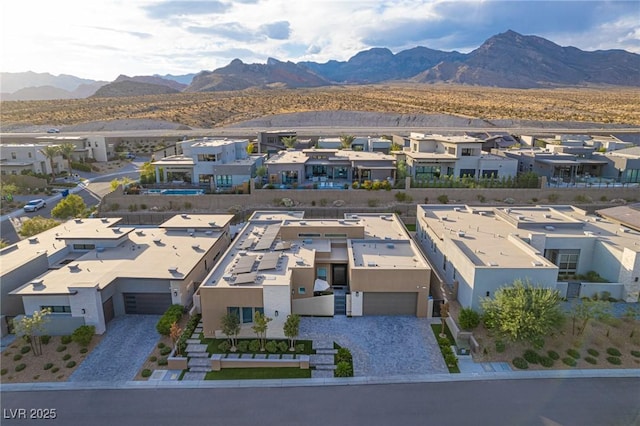 birds eye view of property featuring a residential view and a mountain view