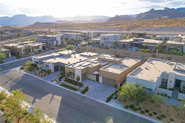 birds eye view of property with a residential view and a mountain view