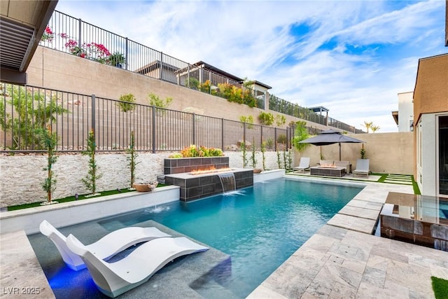 view of pool with an outdoor fire pit, a jacuzzi, a fenced backyard, and a fenced in pool