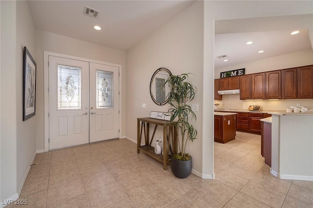 entryway featuring recessed lighting, french doors, visible vents, and baseboards