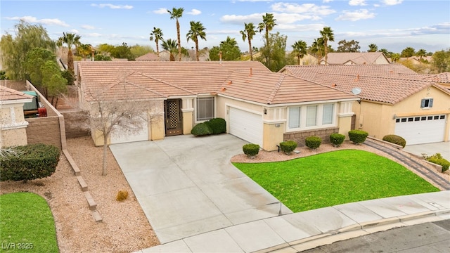 view of front of house with a front yard, stucco siding, concrete driveway, a garage, and a tile roof