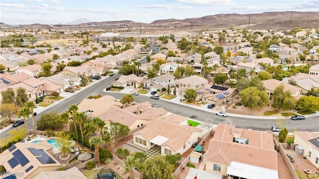 drone / aerial view with a residential view and a mountain view