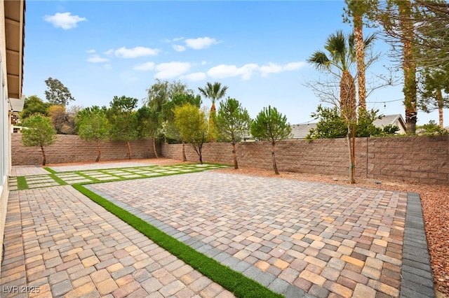 view of patio featuring a fenced backyard