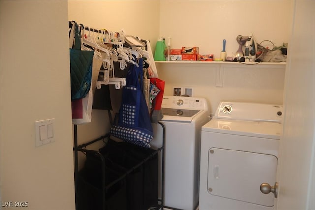 laundry area with laundry area and independent washer and dryer