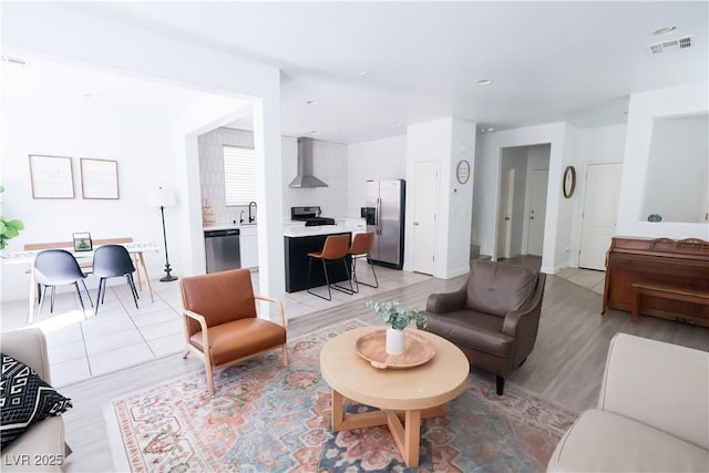 living room with visible vents