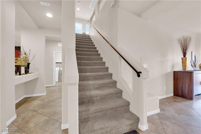 stairs with recessed lighting, visible vents, baseboards, and tile patterned floors