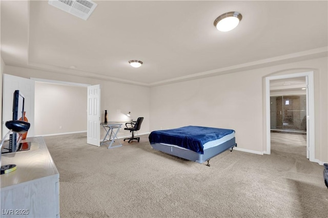 bedroom featuring baseboards, visible vents, and carpet flooring