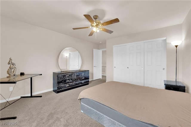 carpeted bedroom featuring ceiling fan, baseboards, and a closet