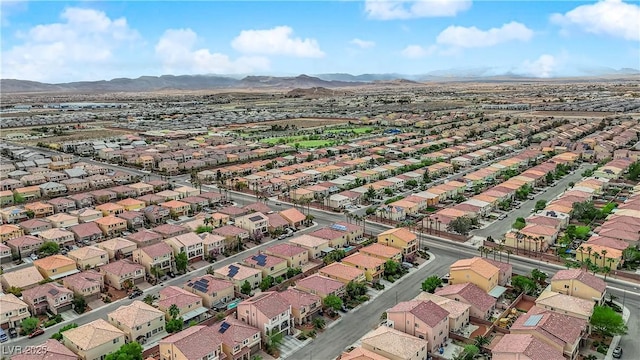 drone / aerial view featuring a mountain view and a residential view