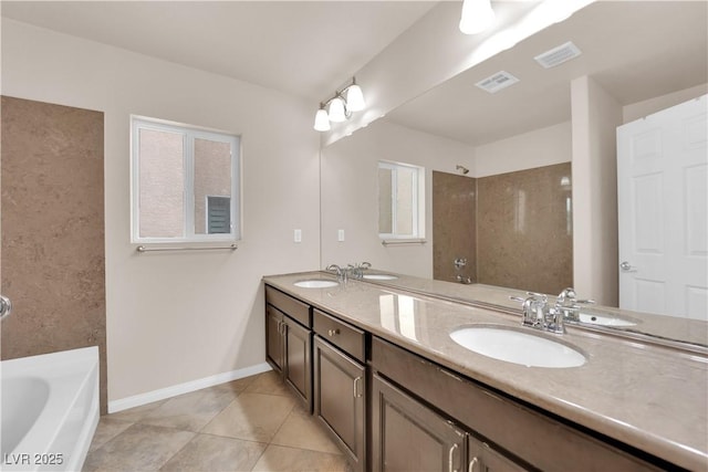 full bath featuring a sink and visible vents