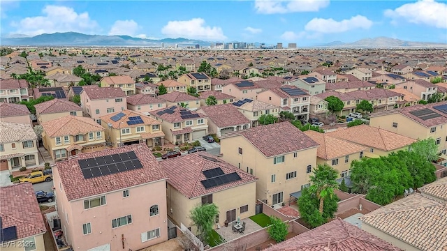 drone / aerial view with a residential view and a mountain view